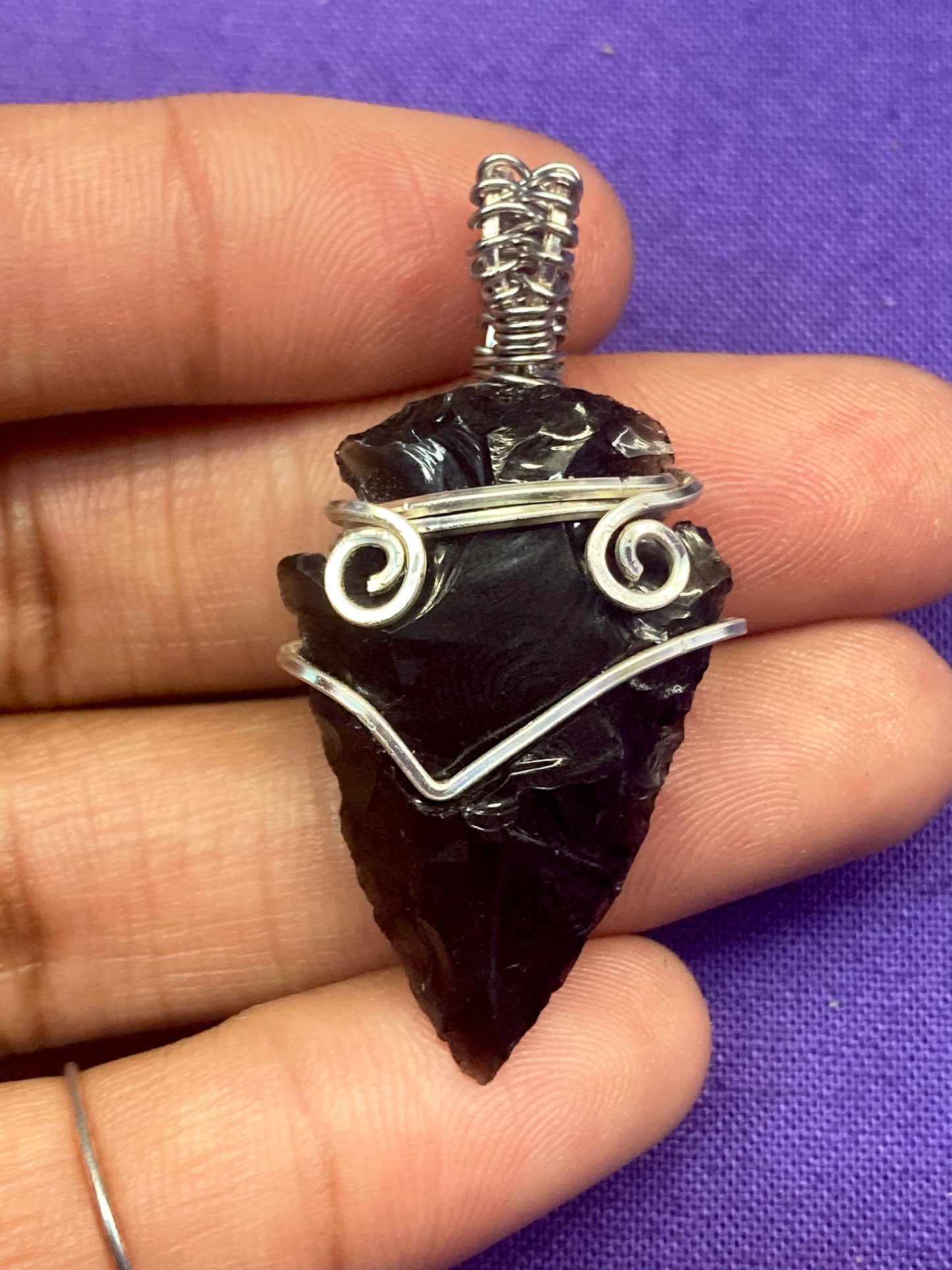 Check Arrowhead Pendant